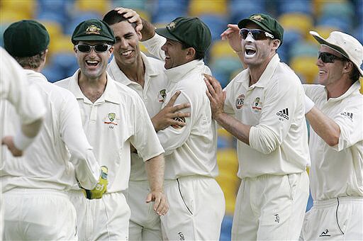 Australia's left-arm pacer Mitchell Johnson, captain Ricky Ponting, Michael Hussey, Brett Lee, Simon Katich and wicketkeeper Brad Haddin celebrate the wicket of West Indies' Dwayne Bravo on the second day of their third and final Test at Kensington Oval in Bridgetown, Barbados on June 13, 2008. Day 2: Aus vs WI, 3rd Test